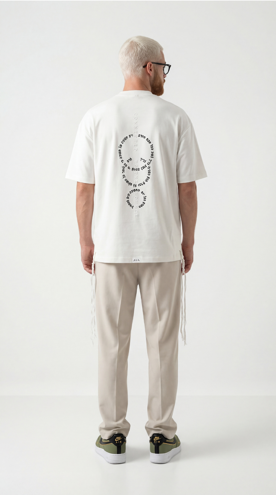 Source Connection oversize tzitzit shirt in cream - back | 613 by MitzvahArt