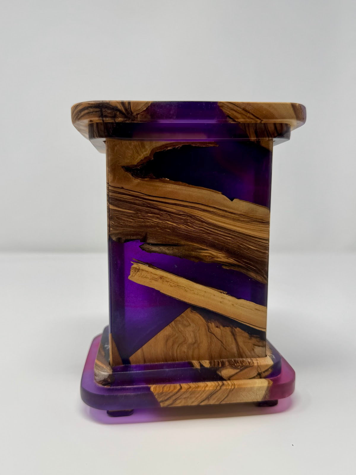 Olive wood tzedakah box with purple epoxy – front view, handmade in Israel