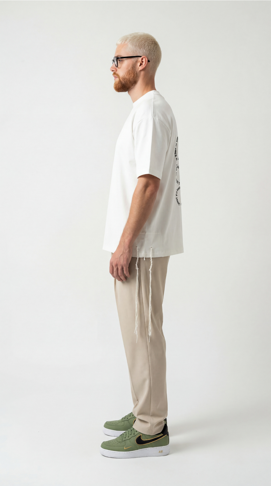 Source Connection oversize tzitzit shirt in cream - side | 613 by MitzvahArt
