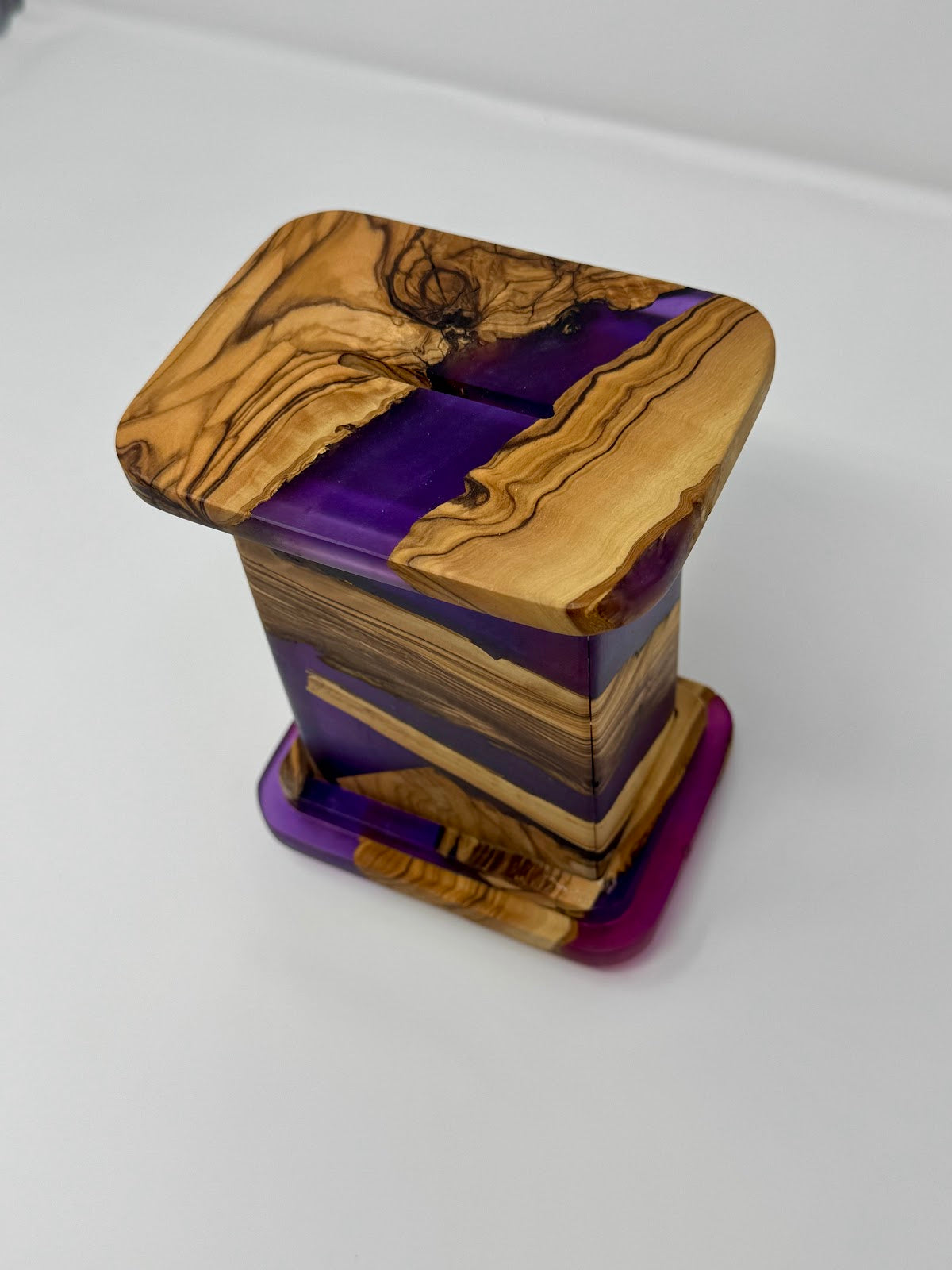 Handmade pushke in olive wood and epoxy – overhead angle showing the overhanging lid