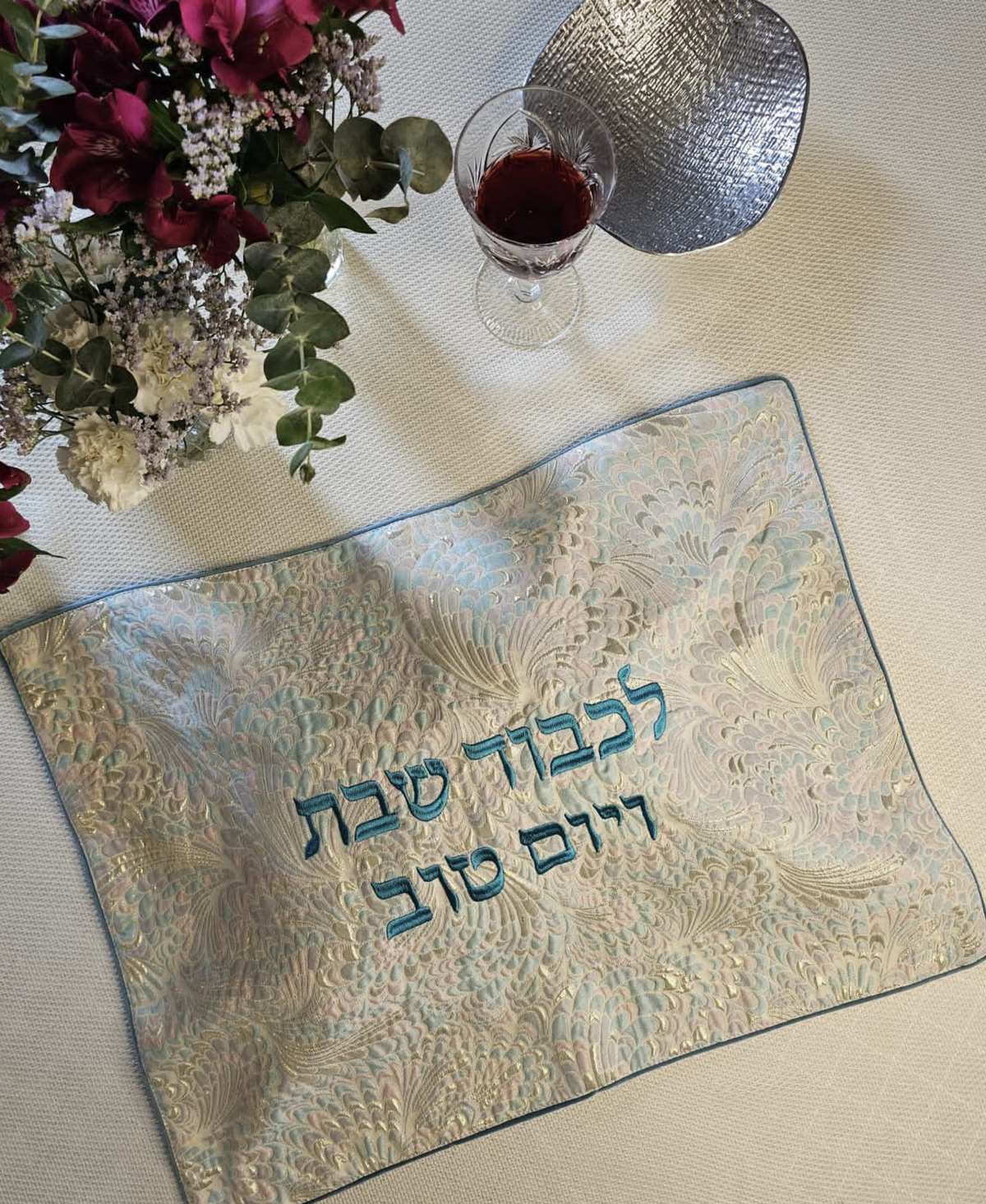 Wintered Mermaid challah cover in teal brocade jacquard with embroidered lettering | MitzvahArt