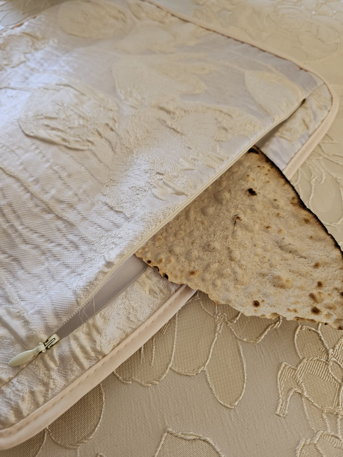 White Tulip matzah set shown on the seder table | MitzvahArt