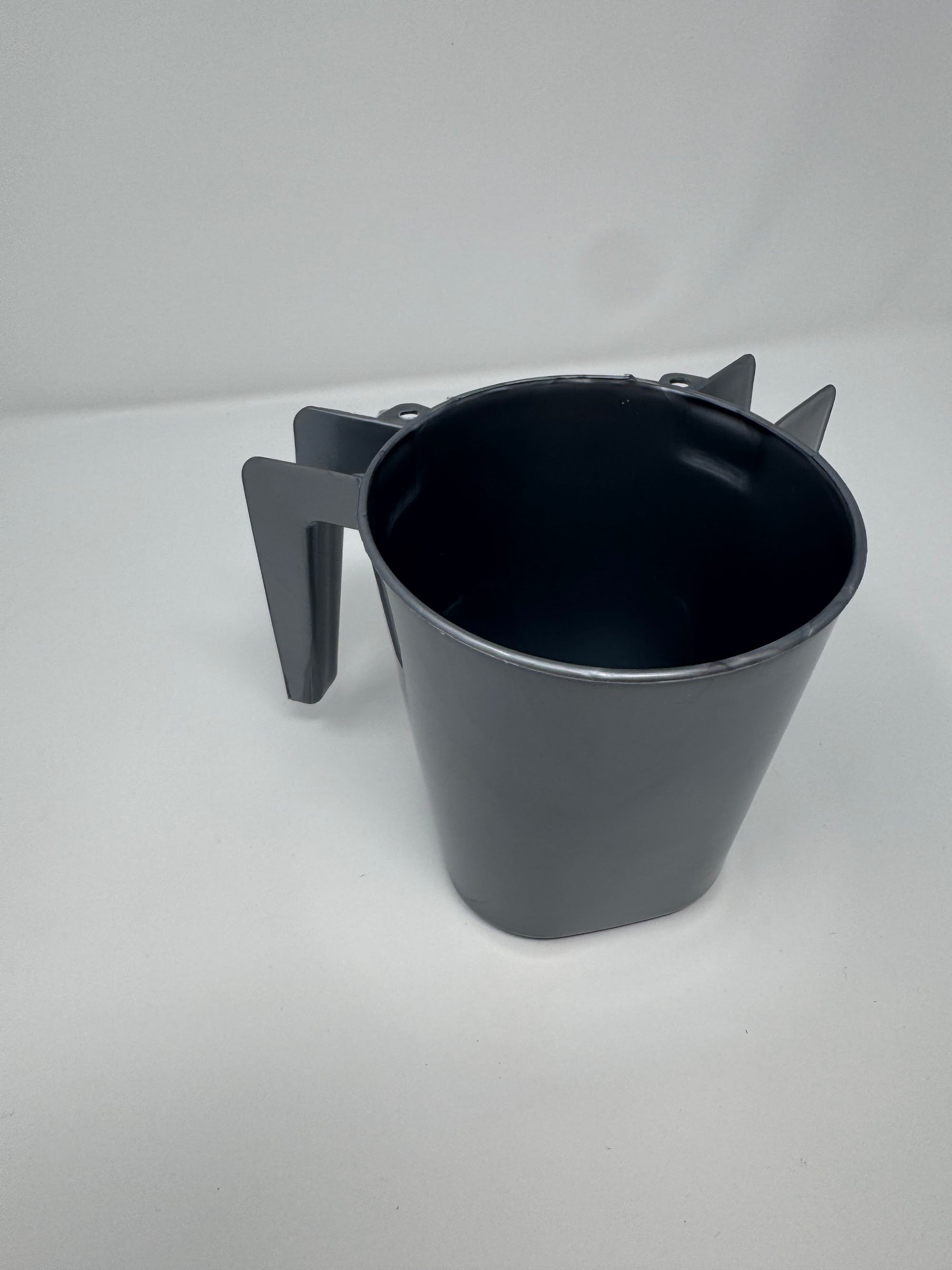 Grey plastic washing cup, angled view showing the interior | MitzvahArt