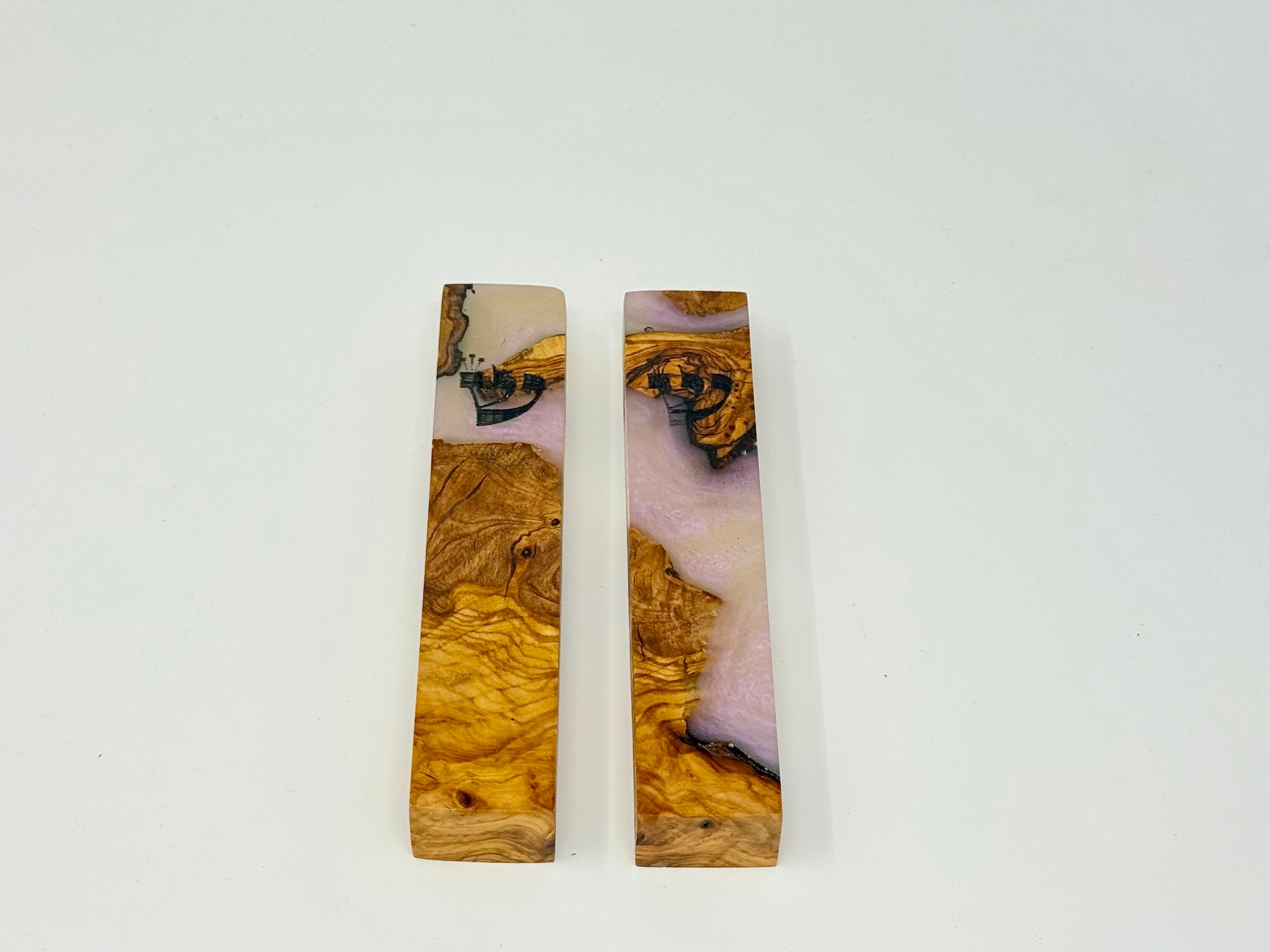 Pink olive wood and resin mezuzah cases, angled view, 12 cm | MitzvahArt