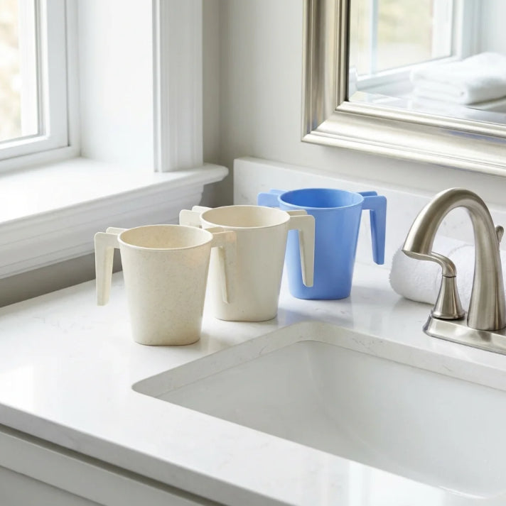 Plastic washing cups at the kitchen sink, ready for netilat yadayim | MitzvahArt