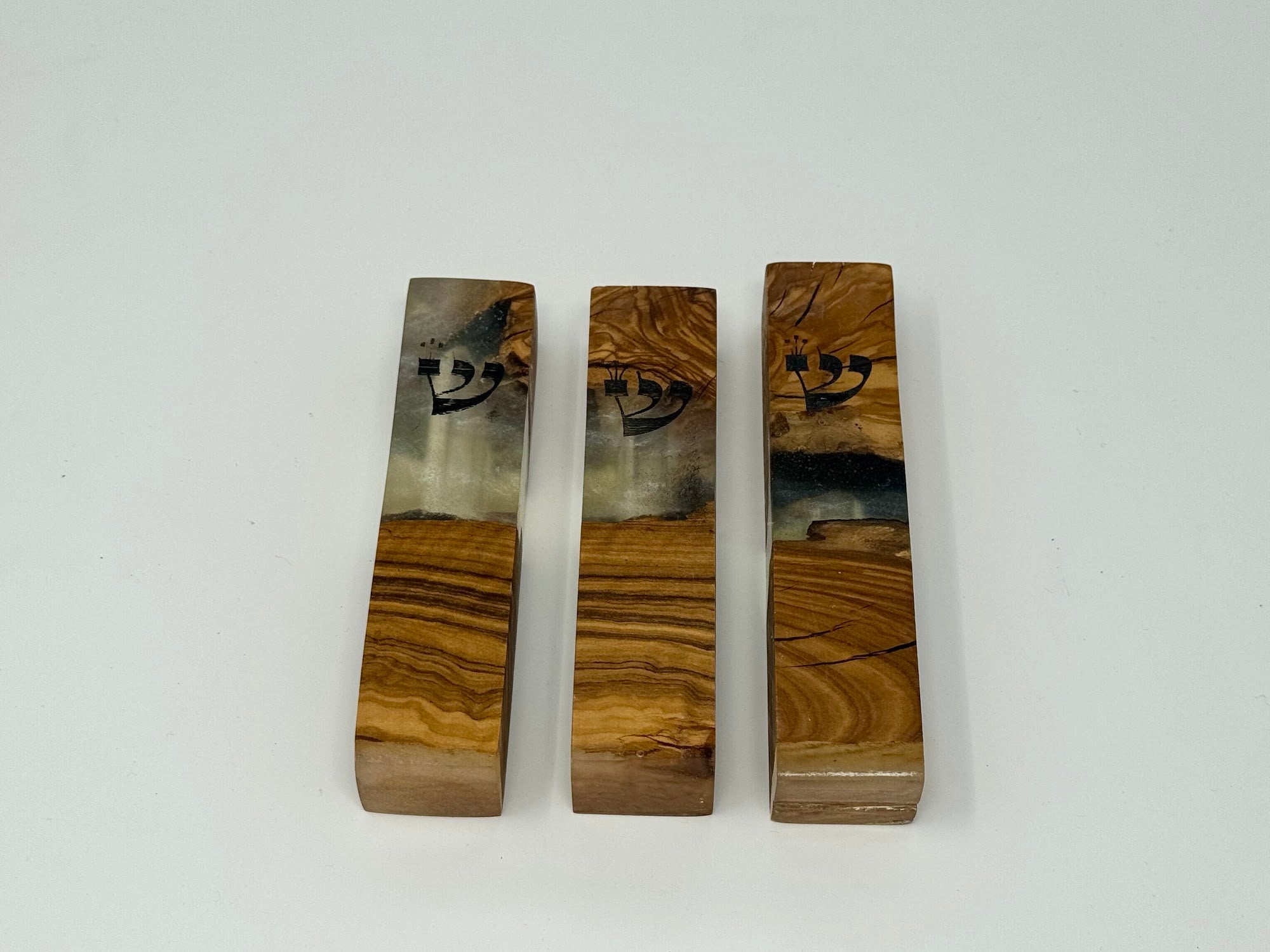 Clear and cream olive wood and resin mezuzah cases, angled view, 10 cm | MitzvahArt