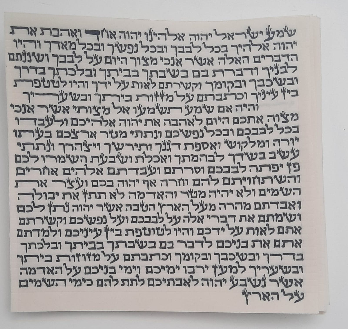 Mezuzah parchment scroll (klaf) handwritten by a sofer in Jerusalem | MitzvahArt