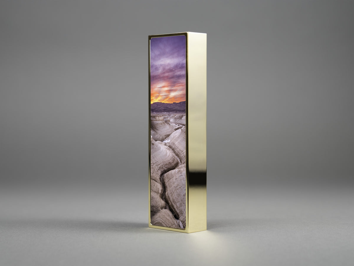 Ablaze Mezuzah in gold plate, mounted flush to a doorpost | MitzvahArt