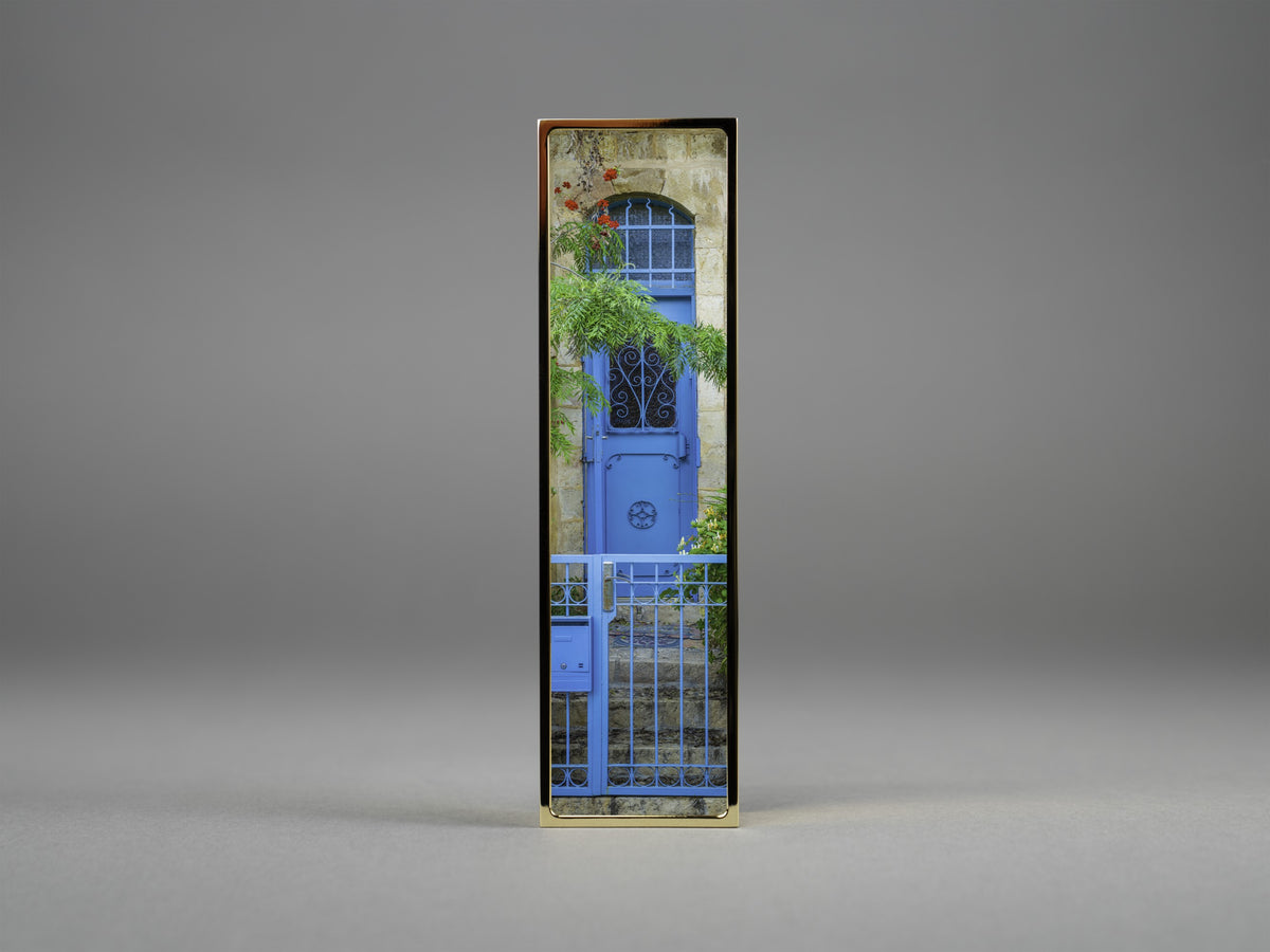 Enter Through Blue Mezuzah in gold plate on a doorpost | MitzvahArt