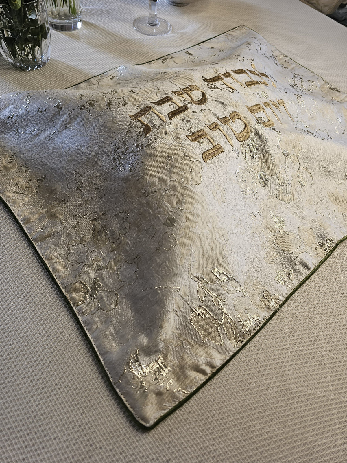Olive Flowers challah cover, close view of the floral weave | MitzvahArt
